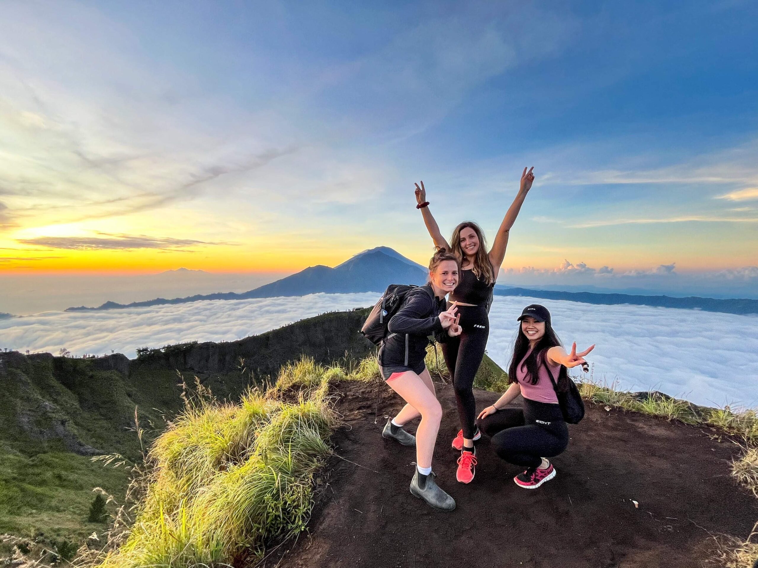Black lava fields and steam vents seen during the Mount Batur sunrise descent.
